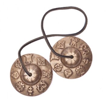 Cymbales tibétaines avec décors (tingsha)